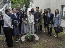 High Representative for Disarmament Affairs, Izumi Nakamitsu and Charlotte Yeung together with young people at the tree planting ceremony